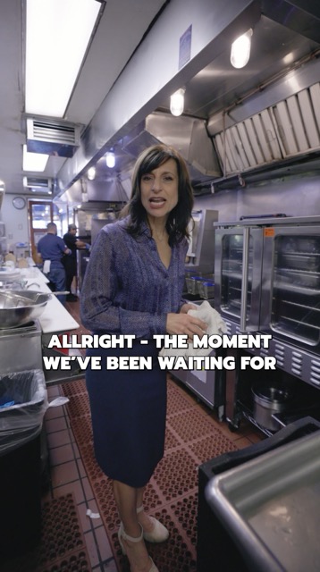 Nicky in the kitchen, with on-image words announcing the moment everyone has been waiting for.